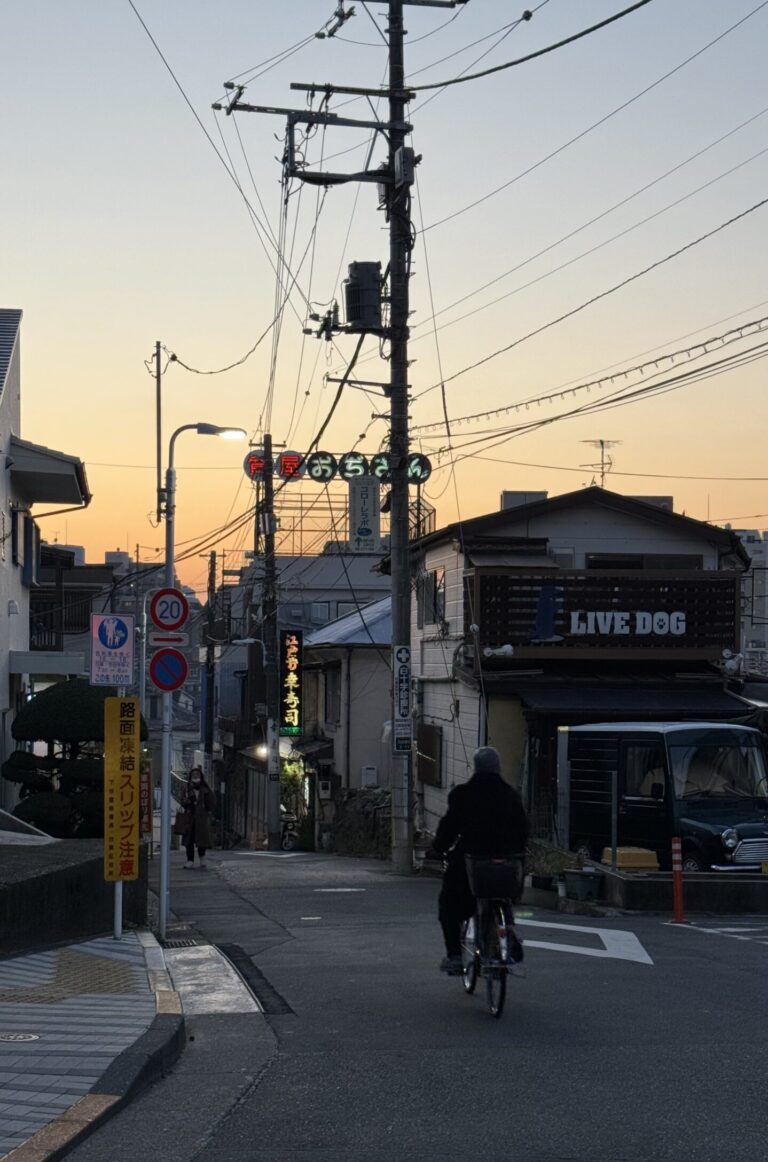 Sunset on Yanaka district with a bike on the road
